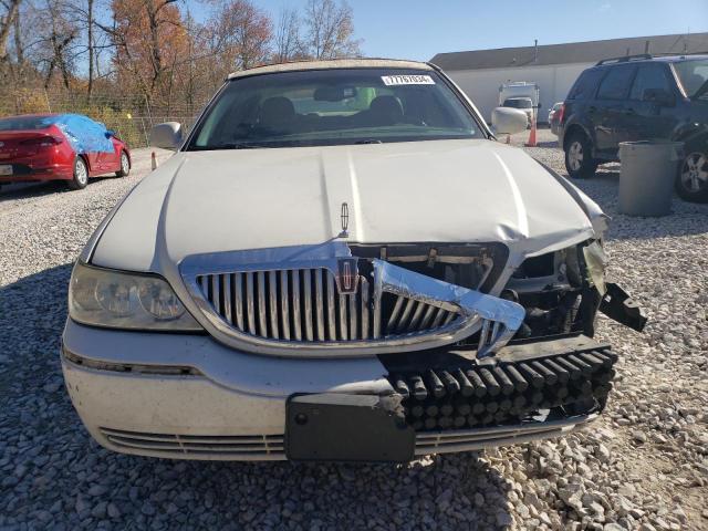 Photo 5 from auction – 2003 LINCOLN TOWN CAR E with VIN 1LNHM81W53Y704656