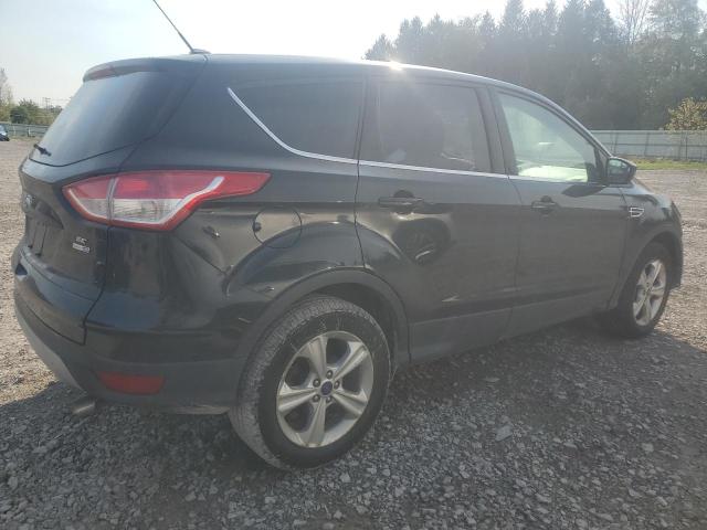 Photo 3 from auction – 2014 FORD ESCAPE SE with VIN 1FMCU9GX5EUB21465