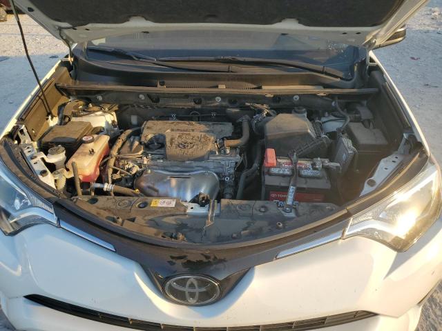 Photo 12 from auction – 2018 TOYOTA RAV4 LE with VIN JTMZFREV3JJ171433