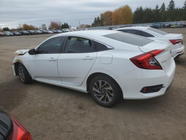 Photo 2 from auction – 2018 HONDA CIVIC with VIN 2HGFC2F65JH036628