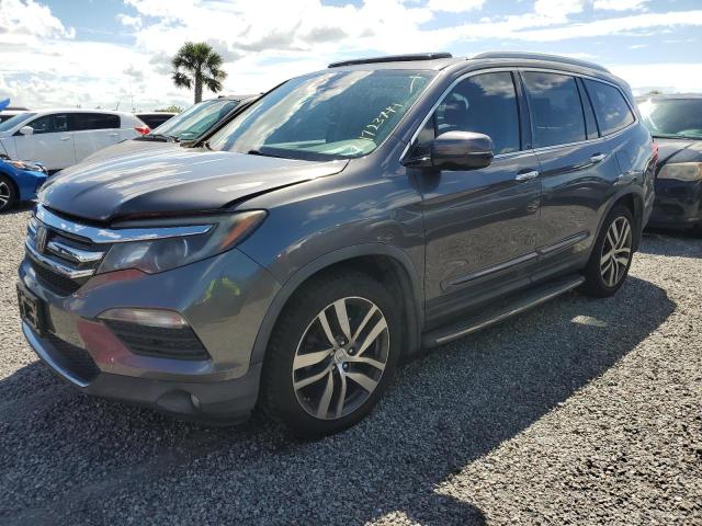 HONDA PILOT ELIT 2016 with VIN 5FNYF6H02GB074198 - Photo from auction