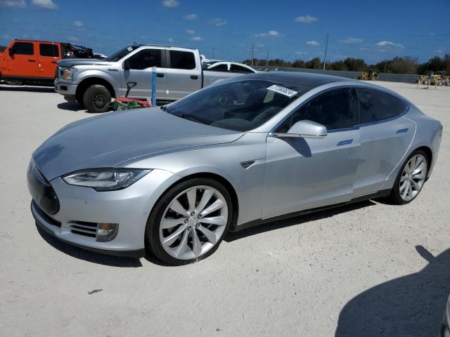 TESLA MODEL S 2015 with VIN 5YJSA1E28FF112481 - Photo from auction
