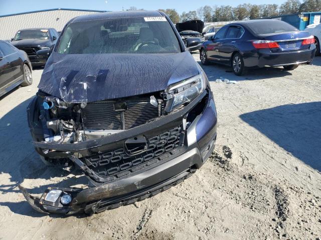 Photo 5 from auction – 2021 HONDA PASSPORT E with VIN 5FNYF7H59MB016005