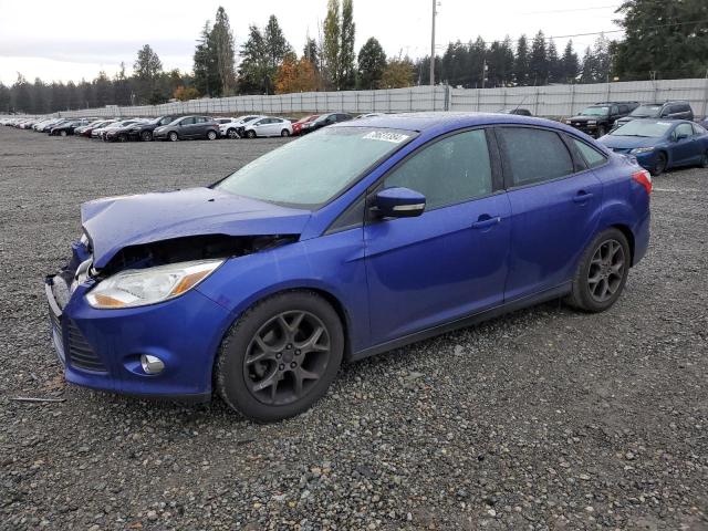 FORD FOCUS SE 2014 with VIN 1FADP3F22EL325977 - Photo from auction