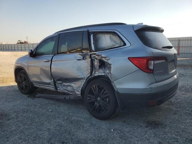 Photo 2 from auction – 2022 HONDA PILOT SE with VIN 5FNYF5H29NB037089