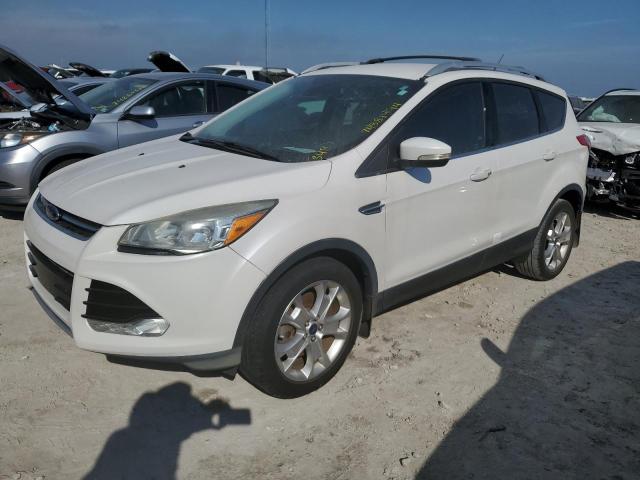 FORD ESCAPE TIT 2016 with VIN 1FMCU0J93GUC73947 - Photo from auction