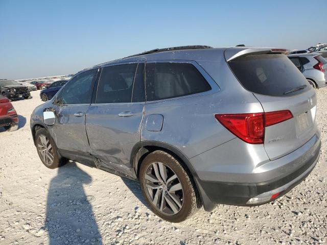 Photo 2 from auction – 2016 HONDA PILOT TOUR with VIN 5FNYF5H99GB057536