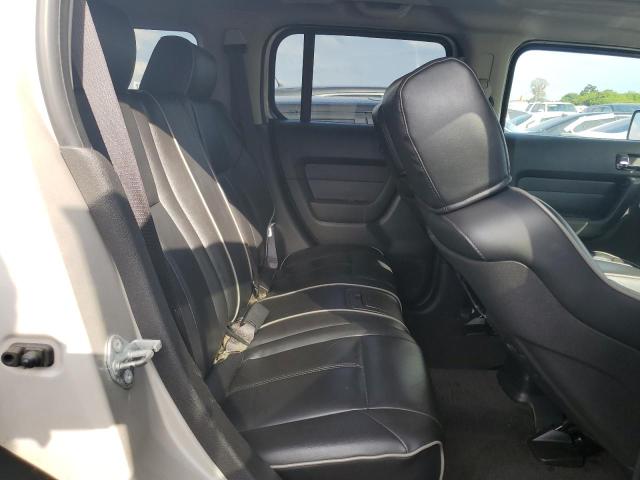 Photo 11 from auction – 2006 HUMMER H3 with VIN 5GTDN136468104647