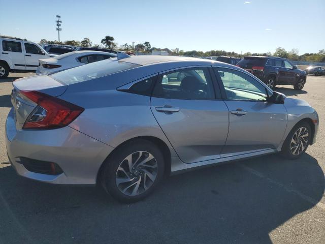 Photo 3 from auction – 2018 HONDA CIVIC EX with VIN 2HGFC2F7XJH557689