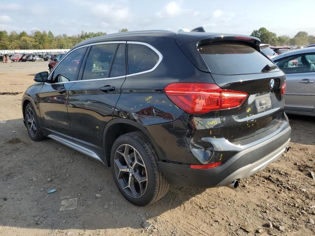 Photo 2 from auction – 2018 BMW X1 XDRIVE2 with VIN WBXHT3C33J5F90612