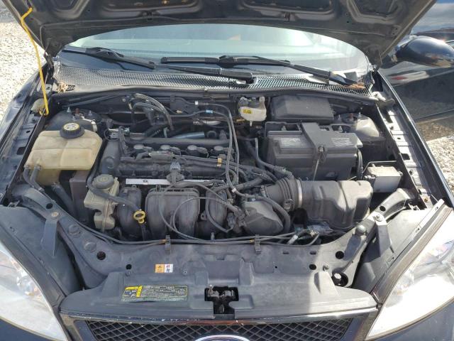 Photo 11 from auction – 2007 FORD FOCUS ZX4 with VIN 1FAFP34NX7W299376