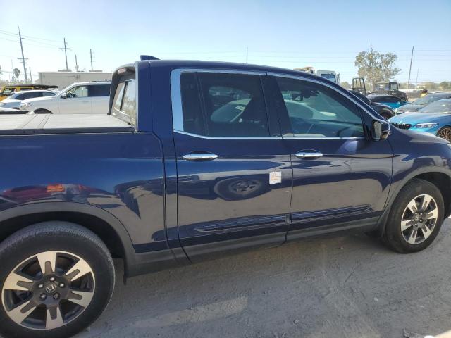 Photo 12 from auction – 2017 HONDA RIDGELINE with VIN 5FPYK3F75HB001927