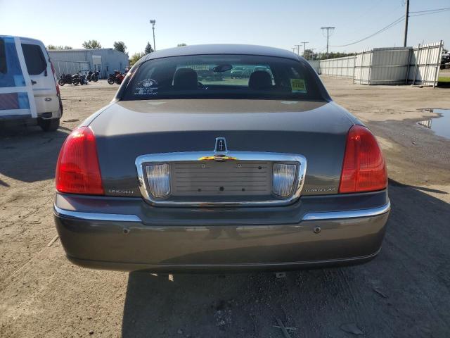 Photo 6 from auction – 2004 LINCOLN TOWN CAR E with VIN 1LNHM81W14Y614647