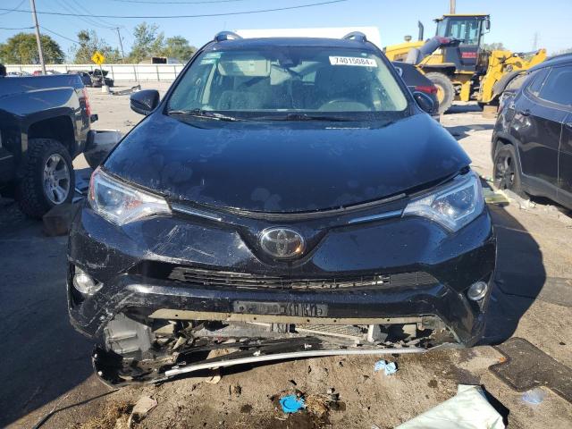 Photo 5 from auction – 2017 TOYOTA RAV4 XLE with VIN 2T3RFREV5HW681164