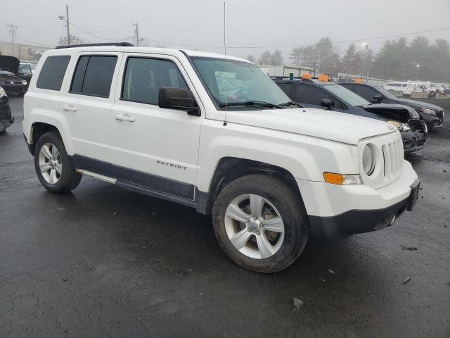 Photo 4 from auction – 2014 JEEP PATRIOT SP with VIN 1C4NJRBB2ED665519