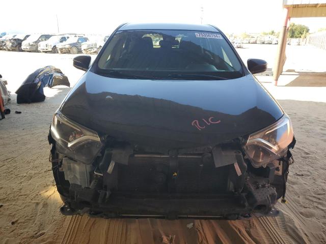 Photo 5 from auction – 2018 TOYOTA RAV4 LE with VIN 2T3ZFREV0JW503099