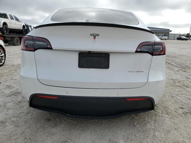 Photo 6 from auction – 2022 TESLA MODEL Y with VIN 7SAYGAEE1NF420838