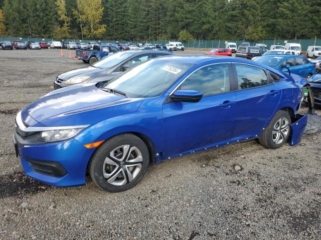 HONDA CIVIC LX 2018 with VIN 2HGFC2F57JH527306 - Photo from auction
