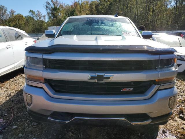 Photo 5 from auction – 2018 CHEVROLET SILVERADO with VIN 3GCUKREC1JG421502