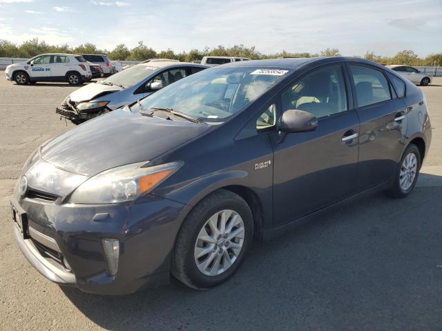 TOYOTA PRIUS PLUG 2012 with VIN JTDKN3DP8C3015660 - Photo from auction
