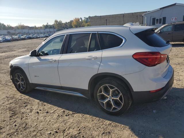 Photo 2 from auction – 2016 BMW X1 XDRIVE2 with VIN WBXHT3C39G5E48788