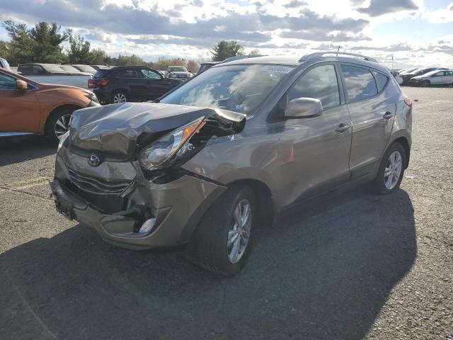 HYUNDAI TUCSON GLS 2011 with VIN KM8JUCAC2BU203563 - Photo from auction