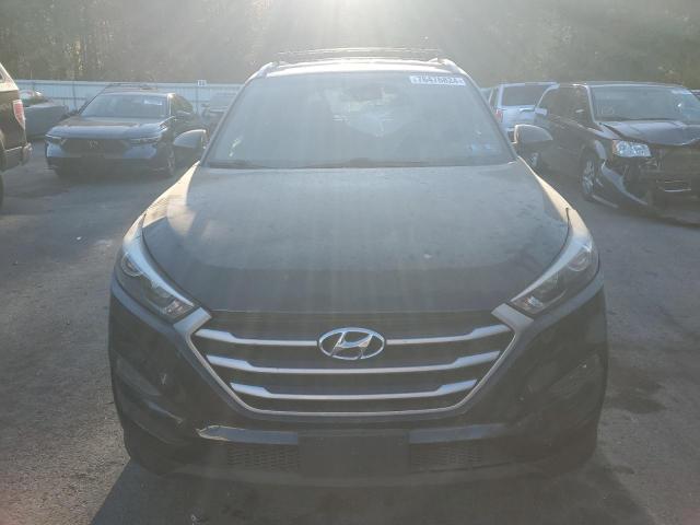 Photo 5 from auction – 2016 HYUNDAI TUCSON LIM with VIN KM8J3CA41GU250943