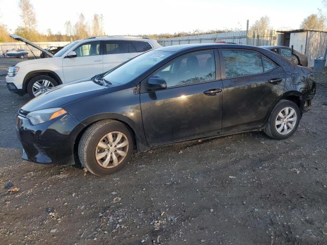 TOYOTA COROLLA L 2014 with VIN 5YFBURHE2EP164378 - Photo from auction