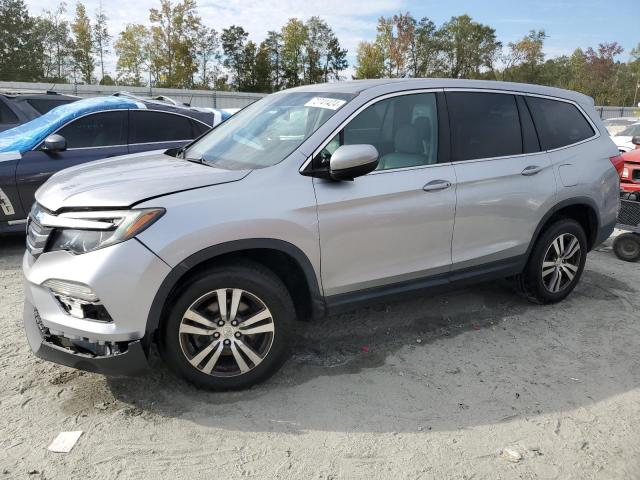 HONDA PILOT EXL 2016 with VIN 5FNYF6H52GB060104 - Photo from auction