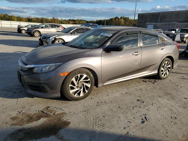 HONDA CIVIC LX 2016 with VIN 2HGFC2F54GH570834 - Photo from auction