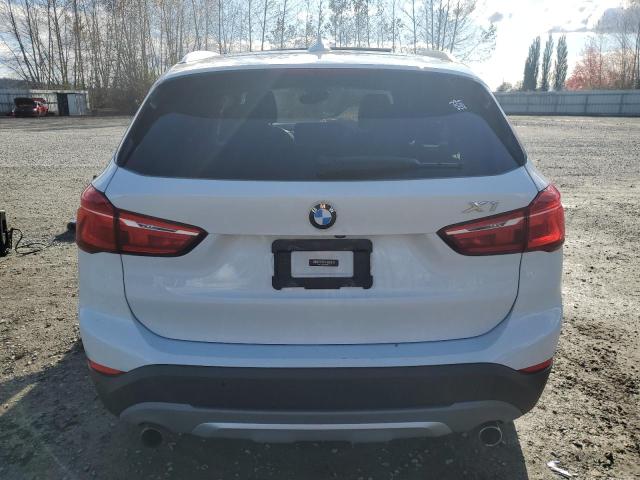 Photo 6 from auction – 2016 BMW X1 XDRIVE2 with VIN WBXHT3C3XG5E52414