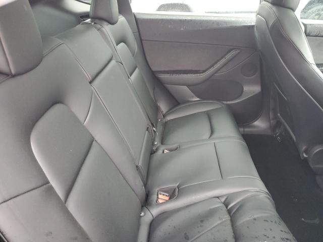 Photo 11 from auction – 2021 TESLA MODEL Y with VIN 5YJYGDEE7MF214209