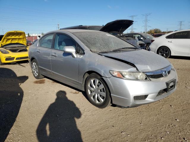 Photo 4 from auction – 2011 HONDA CIVIC LX with VIN 19XFA1F5XBE045912