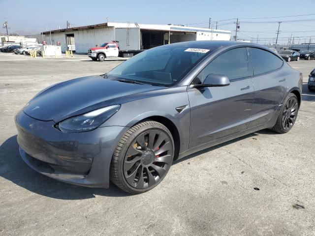 TESLA MODEL 3 2022 with VIN 5YJ3E1EC3NF134890 - Photo from auction