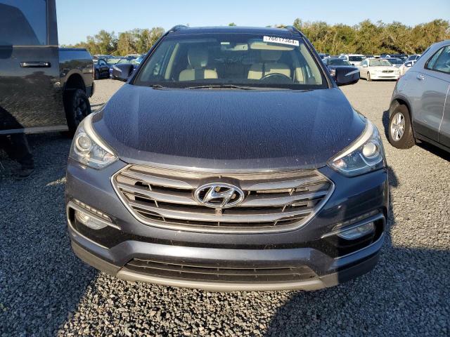 Photo 5 from auction – 2017 HYUNDAI SANTA FE S with VIN 5NMZU3LBXHH045341