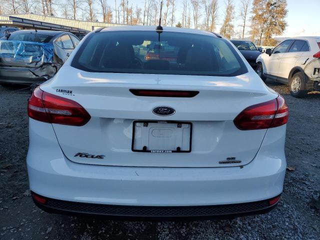 Photo 6 from auction – 2016 FORD FOCUS SE with VIN 1FADP3F26GL239932