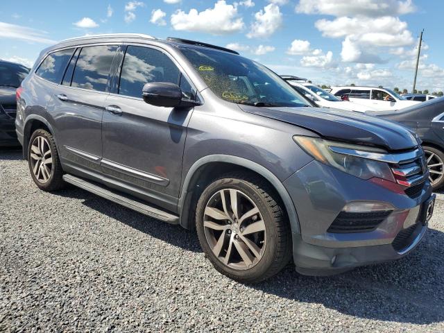 Photo 4 from auction – 2016 HONDA PILOT ELIT with VIN 5FNYF6H02GB074198