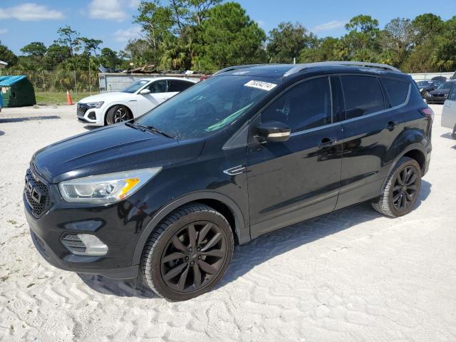 FORD ESCAPE TIT 2017 with VIN 1FMCU9JD4HUC08549 - Photo from auction