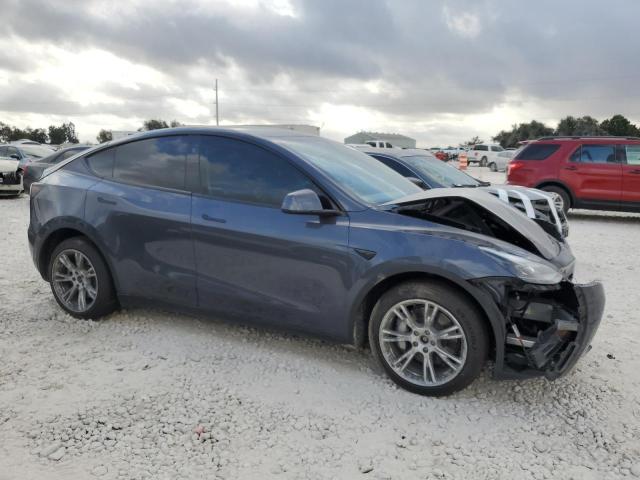 Photo 4 from auction – 2023 TESLA MODEL Y with VIN 7SAYGDEE3PA165028