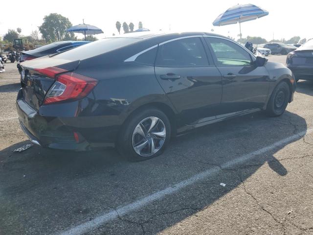 Photo 3 from auction – 2019 HONDA CIVIC LX with VIN 2HGFC2F67KH585605