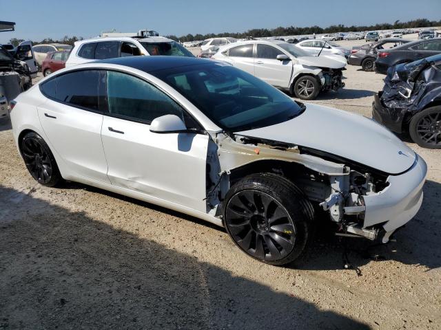 Photo 4 from auction – 2021 TESLA MODEL 3 with VIN 5YJ3E1EB8MF902160