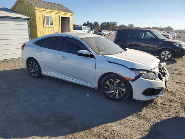 Photo 4 from auction – 2018 HONDA CIVIC EX with VIN 19XFC2F77JE208547