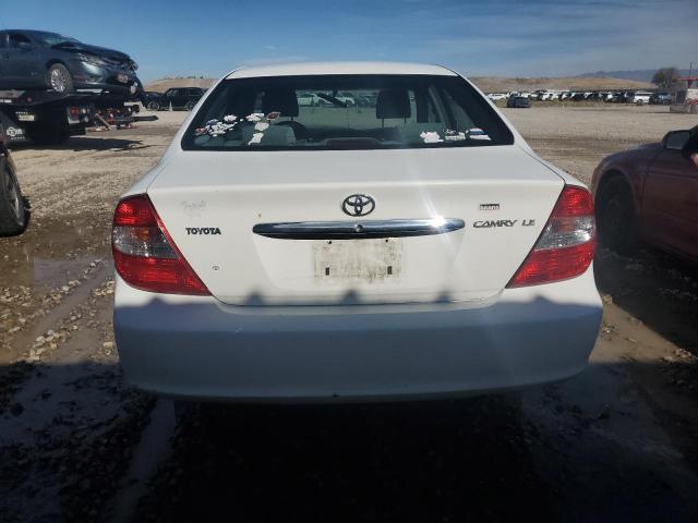 Photo 6 from auction – 2002 TOYOTA CAMRY LE with VIN JTDBE32K520090095
