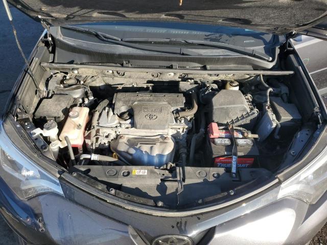 Photo 11 from auction – 2018 TOYOTA RAV4 SE with VIN JTMJFREV6JJ218077