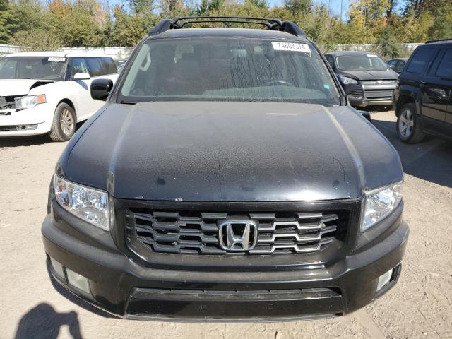 Photo 5 from auction – 2014 HONDA RIDGELINE with VIN 5FPYK1F69EB011903