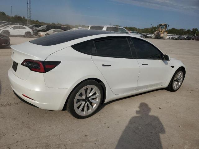 Photo 3 from auction – 2021 TESLA MODEL 3 with VIN 5YJ3E1EA9MF913465