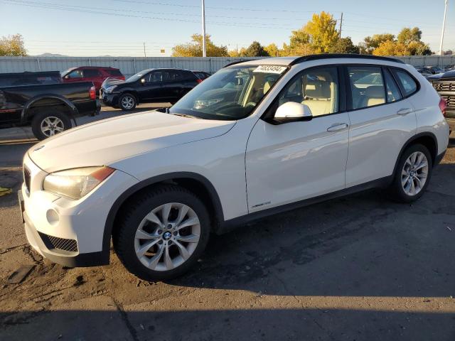 BMW X1 XDRIVE2 2014 with VIN WBAVL1C56EVY21668 - Photo from auction