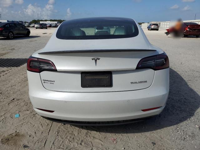 Photo 6 from auction – 2020 TESLA MODEL 3 with VIN 5YJ3E1EC1LF736409