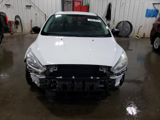 Photo 5 from auction – 2015 FORD FOCUS S with VIN 1FADP3E2XFL283111