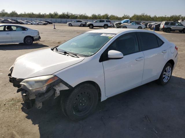 TOYOTA COROLLA L 2015 with VIN 5YFBURHE9FP317372 - Photo from auction